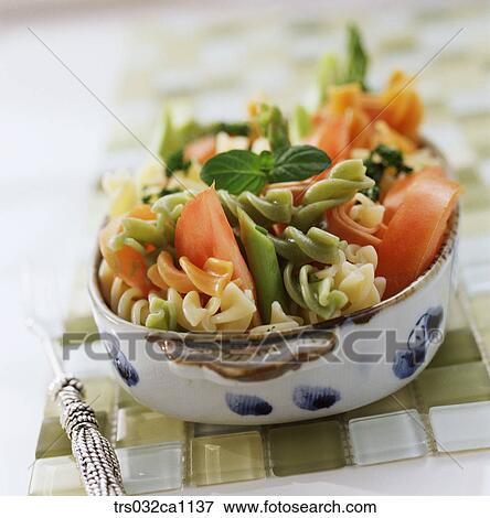 Stock Photo - Western food, dish, food, fusilli, tomato, plate, pasta. Fotosearch