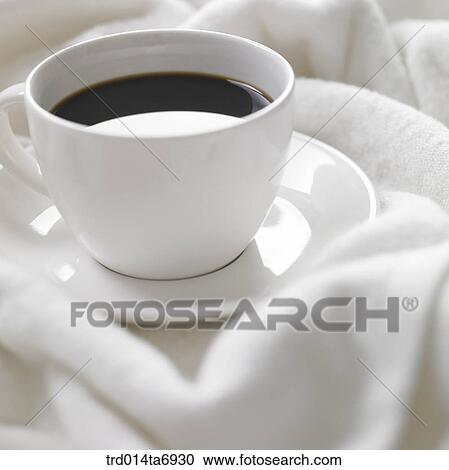 Stock Image - beverage, drink, coffee, coffee cup, plate, towel, closeup. Fotosearch