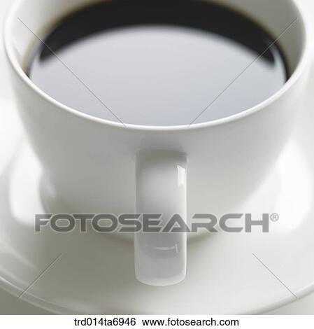 Stock Photograph - beverage, drink, coffee, coffee cup, plate, closeup. Fotosearch