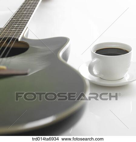 object, music, musical instrument, guitar, closeup, beverage, drink View Large Photo Image Picture - object, music, musical instrument, guitar, closeup, beverage, drink. Fotosearch