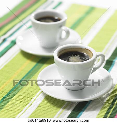 Stock Image - table, beverage, drink, coffee, coffee cup, plate, closeup. Fotosearch
