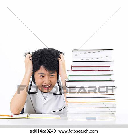 Stock Photo - worrying, high school student, school uniform, education, boy. Fotosearch