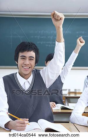 Picture - school uniform, classroom, education, boy, daytime. Fotosearch