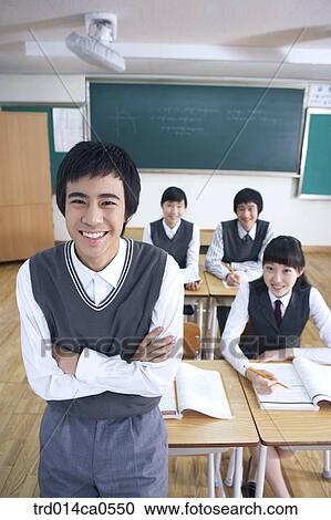school uniform, classroom, education, boy, daytime View Large Photo Image Stock Image - school uniform, classroom, education, boy, daytime. Fotosearch