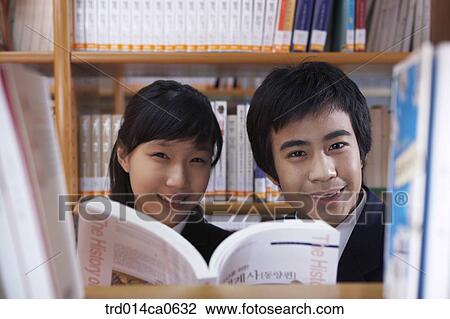 Stock Image - school uniform, classroom, education, boy, daytime. Fotosearch