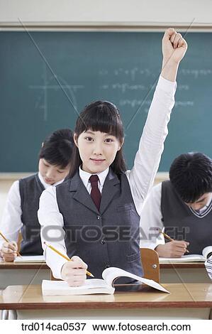 Stock Photo - school uniform, classroom, education, boy, daytime. Fotosearch