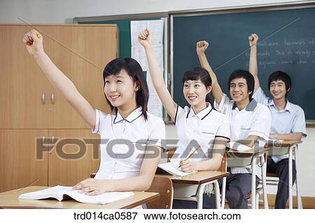 Stock Photo - school uniform, classroom, education, boy, daytime. Fotosearch