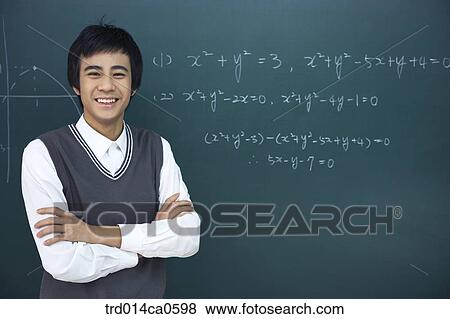 Stock Photo - school uniform, classroom, education, boy, daytime. Fotosearch