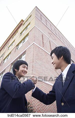 Stock Photo - school uniform, education, boy, daytime, Asian. Fotosearch