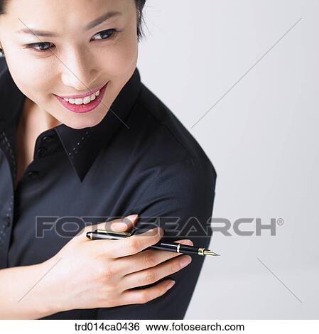black, object, Asian, fountain pen, smile, businessperson View Large Photo Image Stock Photograph - black, object, Asian, fountain pen, smile, businessperson. Fotosearch