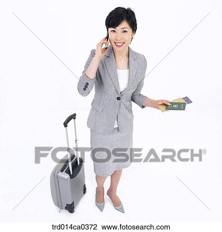 Stock Image - businesswoman, object, business, smile, Asian, airport. Fotosearch