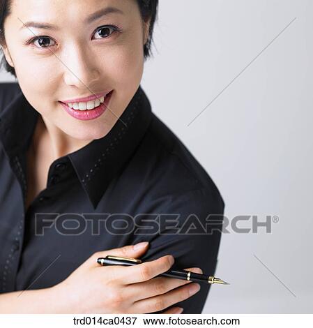 Korean, office worker, black, object, fountain pen, smile View Large Photo Image Stock Photo - Korean, office worker, black, object, fountain pen, smile. Fotosearch