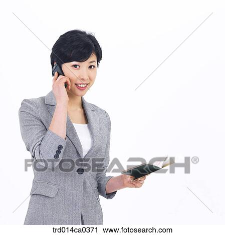 Stock Image - object, Asian, smile, business, person, passport. Fotosearch