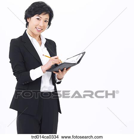 object, diary, Asian, smile, business, businesswoman View Large Photo Image Picture - object, diary, Asian, smile, business, businesswoman. Fotosearch