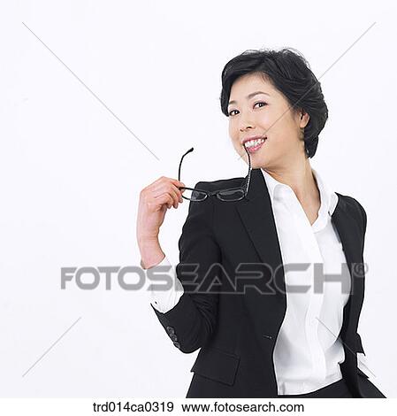 object, glasses, person, hand, glasses, smile View Large Photo Image Stock Photo - object, glasses, person, hand, glasses, smile. Fotosearch