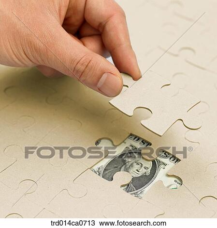 economy, money, hand, piece, bill, concept, puzzle View Large Photo Image Stock Image - economy, money, hand, piece, bill, concept, puzzle. Fotosearch