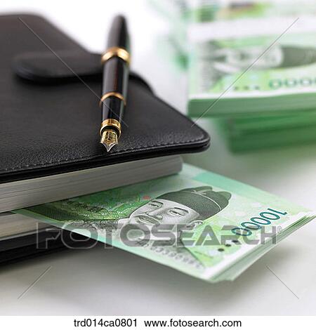Stock Image - object, finance, economy, bill, money, diary, fountain pen. Fotosearch