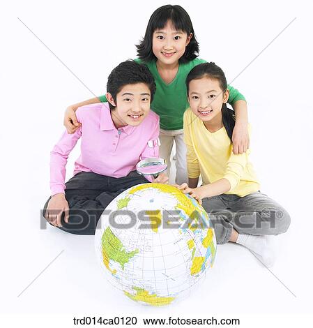 Stock Image - education, boy, object, magnifier, Asian. Fotosearch