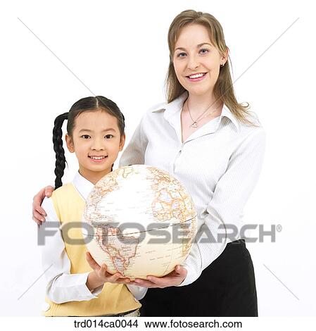 education, object, Asian, smile, white man, person View Large Photo Image Picture - education, object, Asian, smile, white man, person. Fotosearch