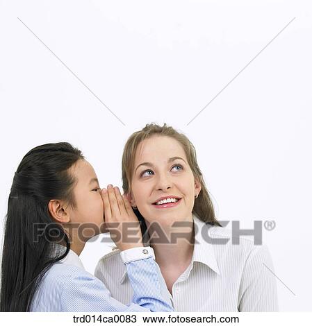 education, whispering, object, Asian, smile, white man View Large Photo Image Stock Image - education, whispering, object, Asian, smile, white man. Fotosearch