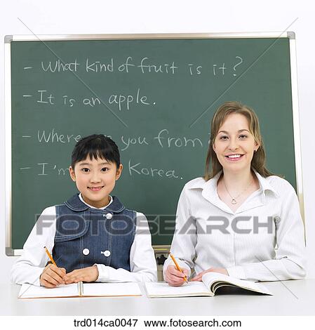 Stock Photo - notebook, education, object, Asian, smile, white man. Fotosearch