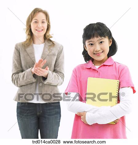 Stock Photo - notebook, object, Asian, smile, clapping, white man. Fotosearch