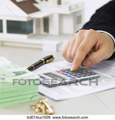 Stock Photo - house, house, model, calculator, fountain pen, pen, money. Fotosearch
