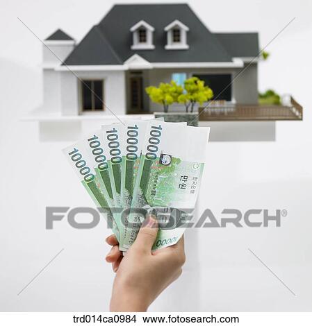 Picture - object, house, model house, house, model, money, bill. Fotosearch