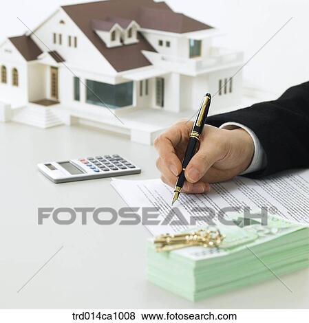 Stock Photo - object, house, model house, house, model, calculator, document. Fotosearch