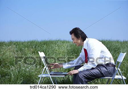 Stock Image - person, Asian, boy, outdoor, rest. Fotosearch