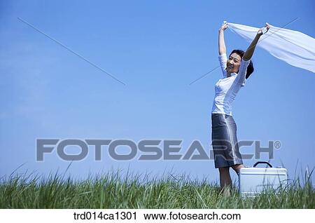 Stock Image - person, Asian, woman, outdoor, rest, business. Fotosearch