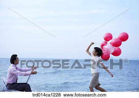 Stock Photo - person, Asian, boy, woman, outdoor. Fotosearch