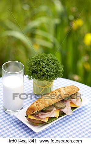 Stock Image - outdoor, garden, day, daytime, food, bread, milkcup. Fotosearch