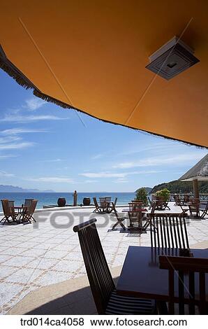 Stock Photo - beach, day, daytime, daylight, water, blue, shadow. Fotosearch