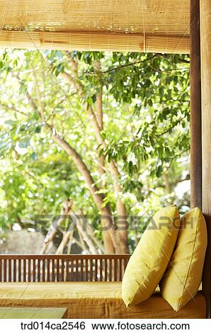 Stock Photograph - indoor, day, daytime, bed, cushion, pillow. Fotosearch