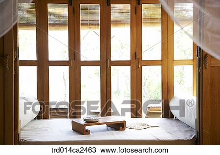 Stock Image - indoor, day, daytime, window, table, dinnertable, plate. Fotosearch