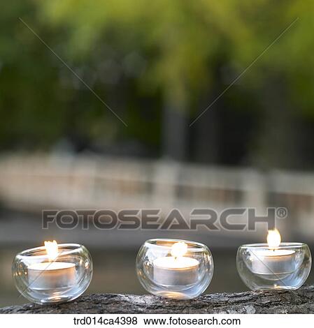 Stock Photo - Candleholder, tealight, candlelight. Fotosearch