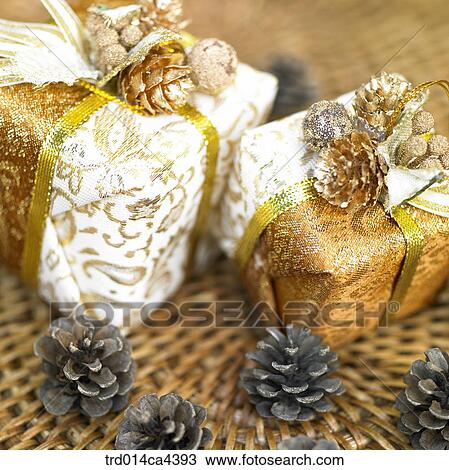 Stock Image - pinecone, basket, present, gift, case, packingcase. Fotosearch