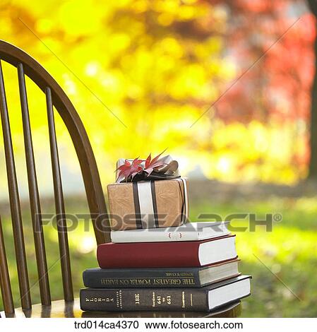 present, fall, books, book, chair, gift, autumn View Large Photo Image Stock Image - present, fall, books, book, chair, gift, autumn. Fotosearch