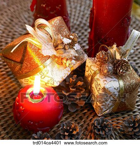 present, gift, packing, goldencolor, red, candle, candlelight View Large Photo Image Stock Image - present, gift, packing, goldencolor, red, candle, candlelight. Fotosearch