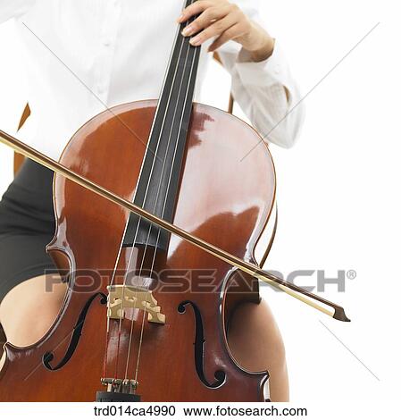 Stock Image - object, studioshot, music, musicalperformance, performance, cello, musicalinstrument. Fotosearch