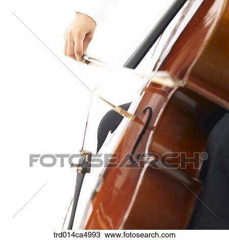 Stock Image - object, studioshot, music, musicalperformance, performance, cello, musicalinstrument. Fotosearch