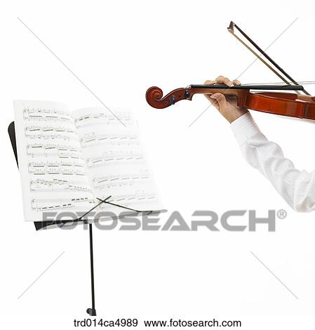 Stock Photo - object, studioshot, music, musicalperformance, performance, violine, musicalinstrument. Fotosearch