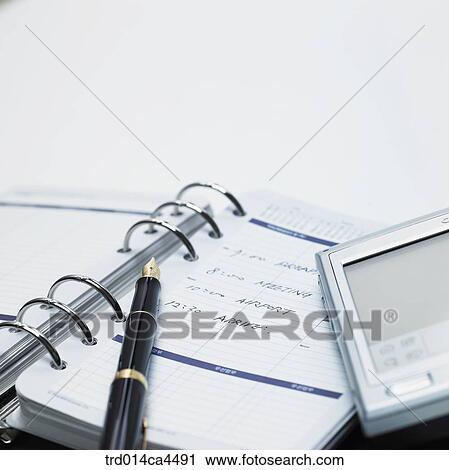 Stock Image - indoor, day, daytime, PDA, diary, notebook, reminderbook. Fotosearch