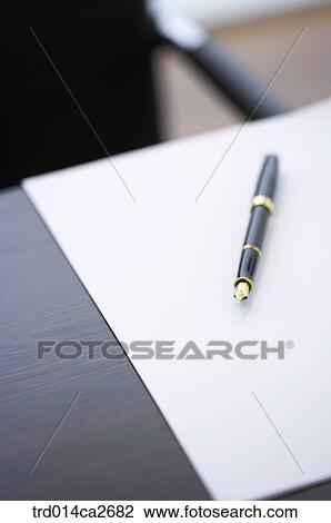 Stock Image - indoor, stilllife, pen, desk, chair, fountainpen. Fotosearch