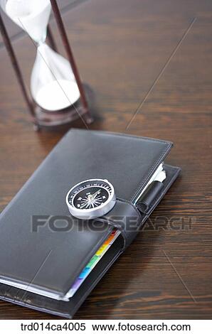 still, stilllife, still-life, sandglass, hourglass, focus, compass View Large Photo Image Stock Photography - still, stilllife, still-life, sandglass, hourglass, focus, compass. Fotosearch