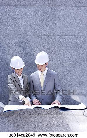 Stock Photo - person, people, severalhumanrace, westernperson, coucasian, oriental, orientals. Fotosearch