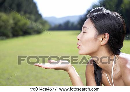 Stock Photo - person, people, oriental, orientals, orientalpeople, korean, woman. Fotosearch