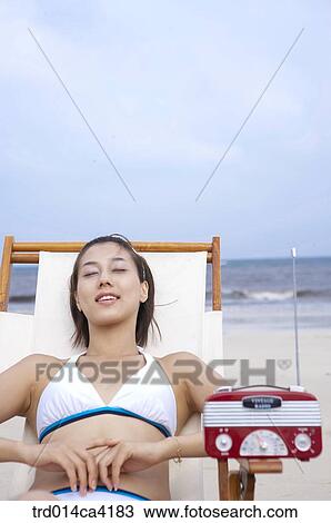 sky, sea, horizon, smile, bust, swimwear, swimsuit View Large Photo Image Stock Image - sky, sea, horizon, smile, bust, swimwear, swimsuit. Fotosearch