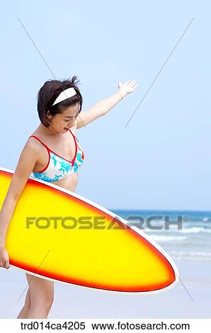 Stock Photography - sky, sea, horizon, smile, hairband, strap, swimwear. Fotosearch